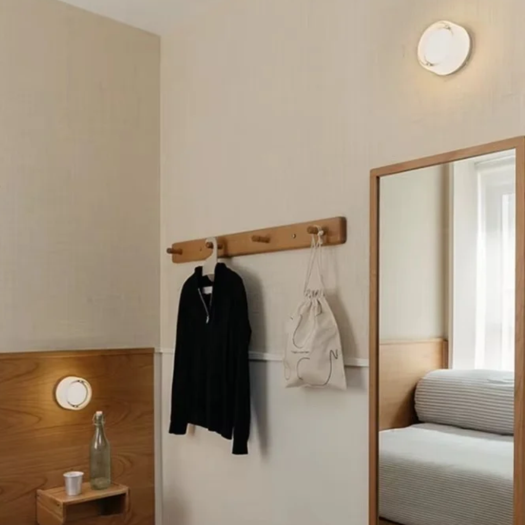 The Ambrelle Round Amber LED Wall Sconce Wall Light