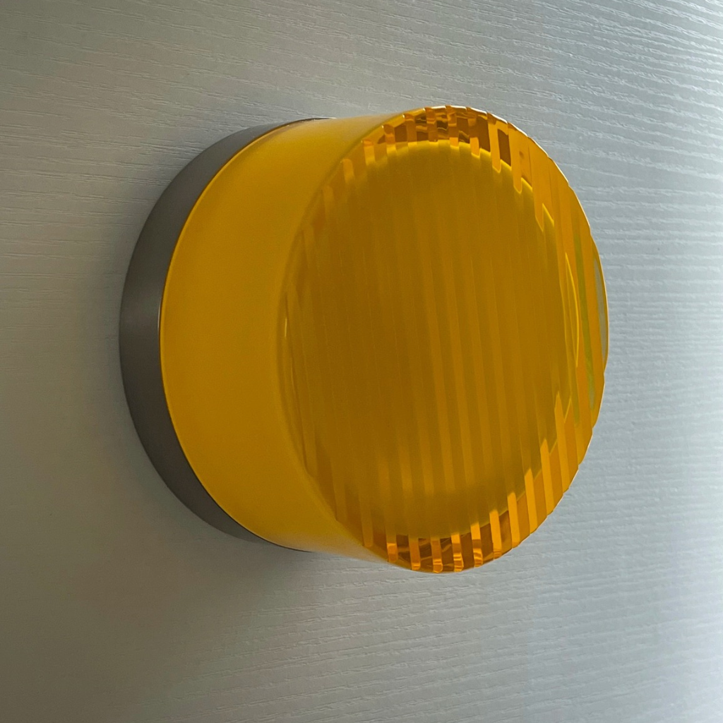 The Ambrelle Round Amber LED Wall Sconce Wall Light