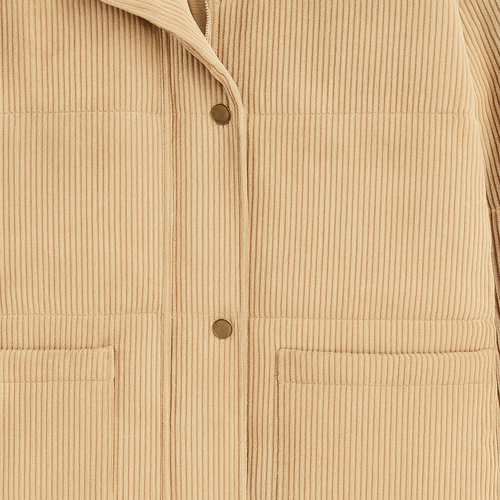 Corduroy puffer jacket with a high collar, front snap and zip closure, long sleeves with elastic cuffs, and large front patch pockets.