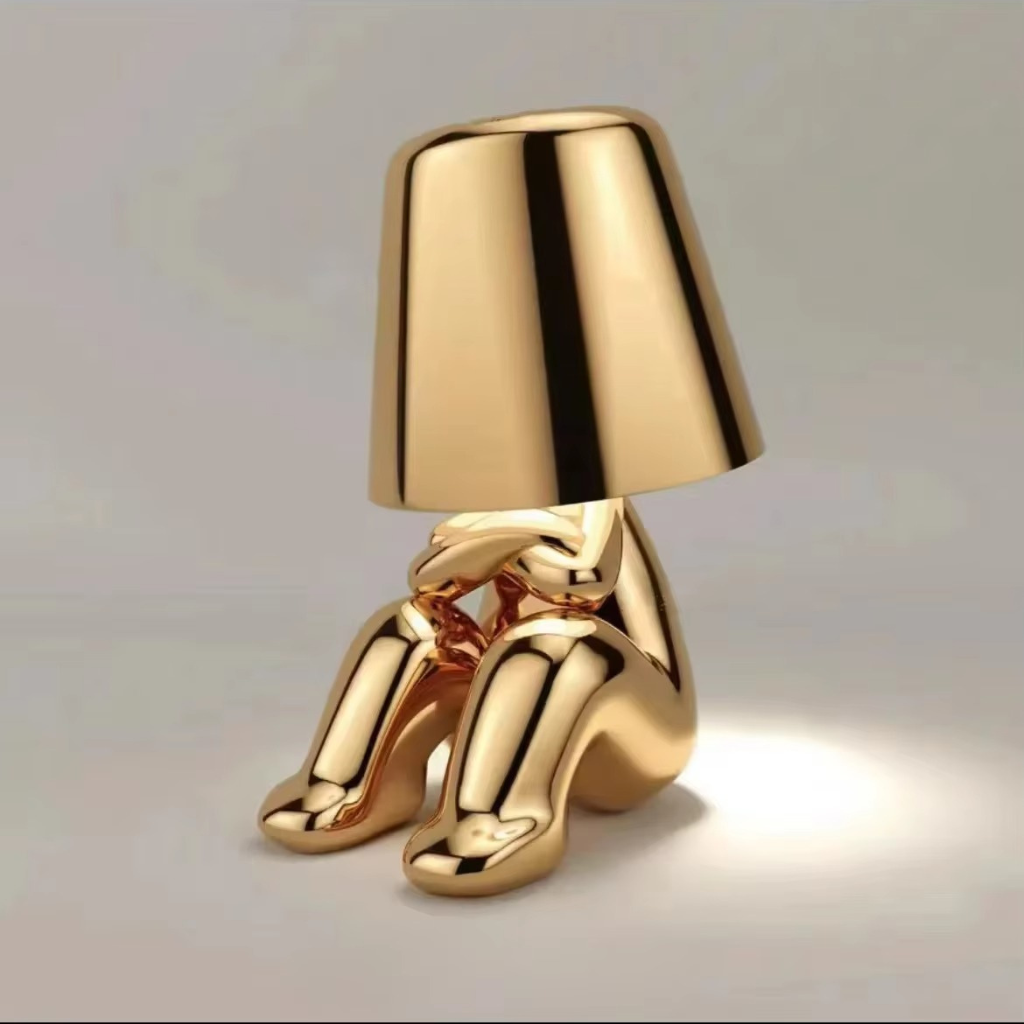 The Thinkra USB Statue Desk Lamp